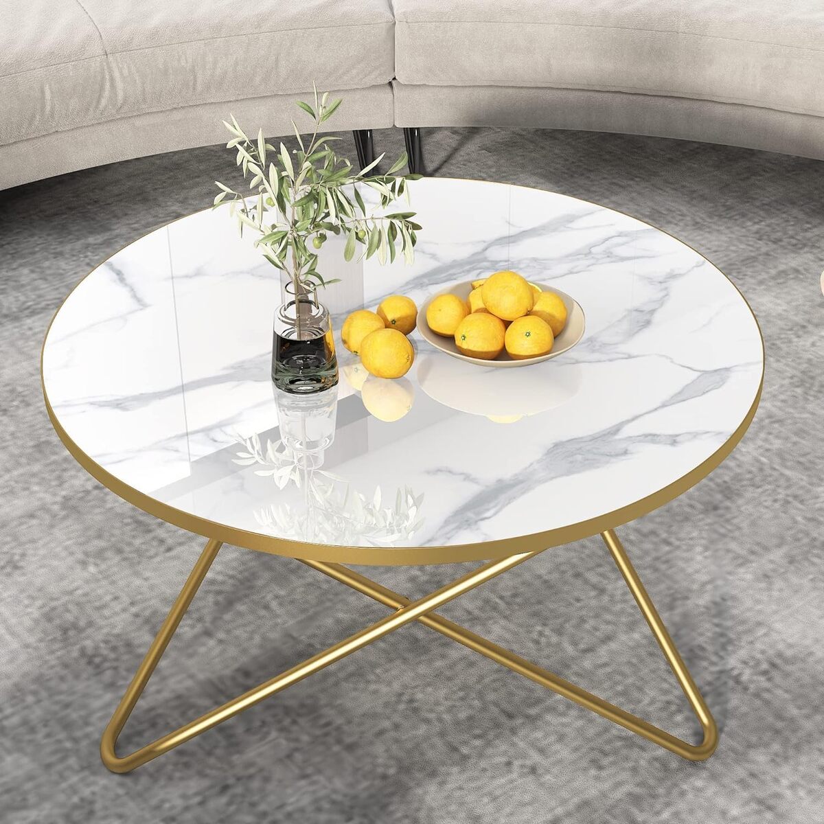 Avis sur la table basse ronde blanche et dorée Holtico : élégance moderne