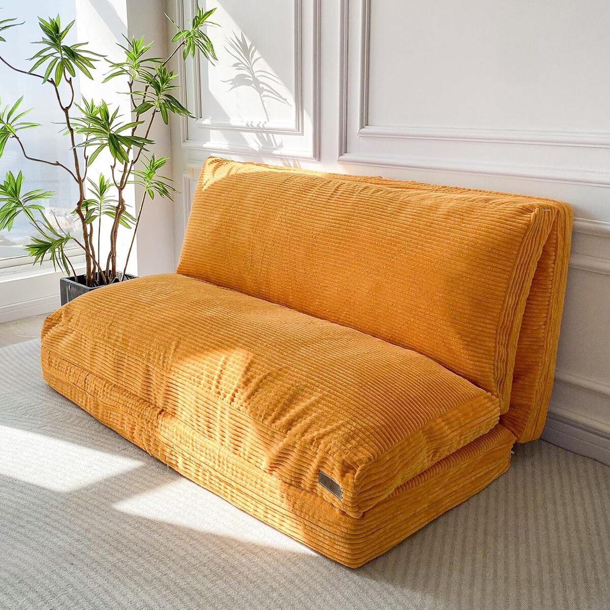Test : pouf pliable MAXYOYO en velours côtelé orange